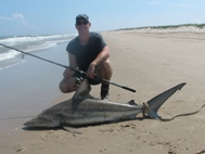 Nick Somogyi with a Lesser Blacktipped shark on a spinning rig